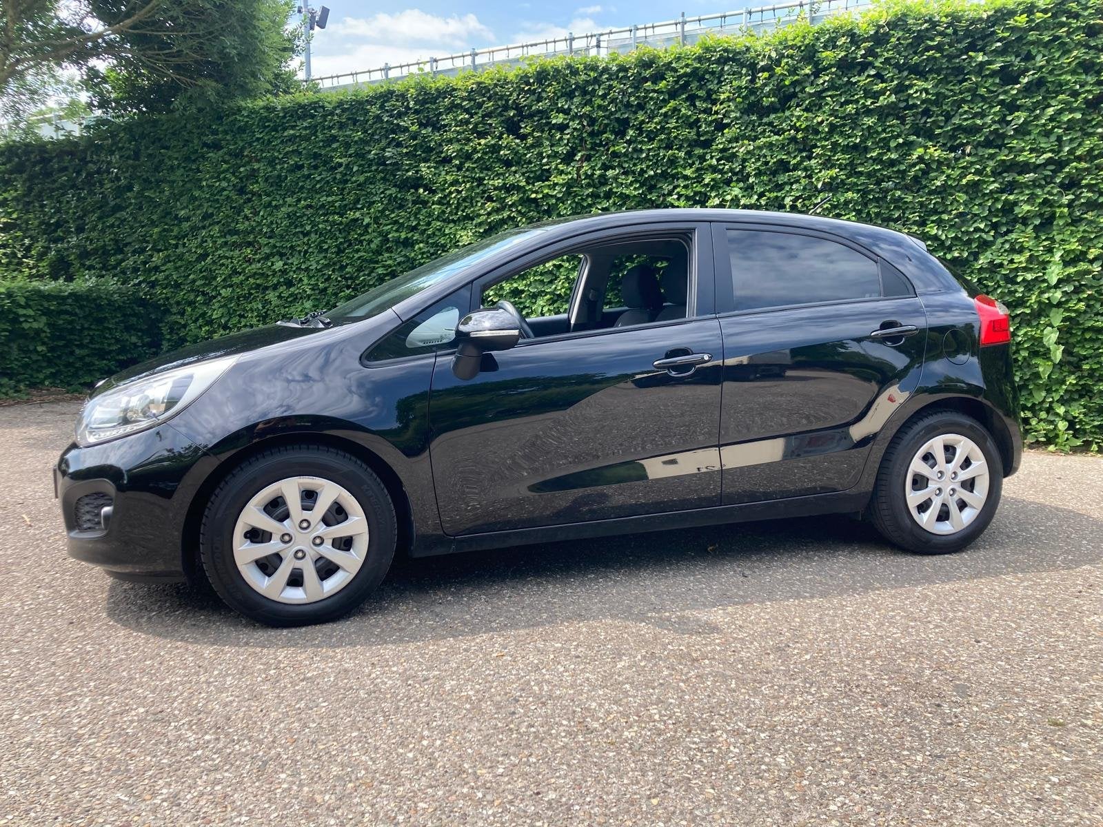 Kia Rio 1.2 CVVT Plus Pack (bj 2011), Auto's, Euro 5, 4 cilinders, Zwart, Origineel Nederlands