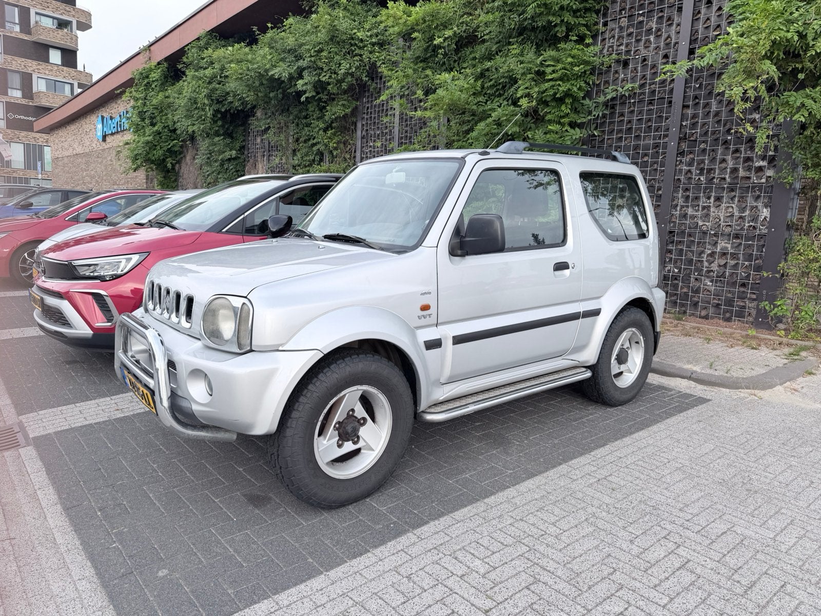 Suzuki Jimny 1.3 4WD 2005 Grijs, Auto's, Suzuki, 40 €/maand, Zwart, 4 stoelen, Vierwielaandrijving