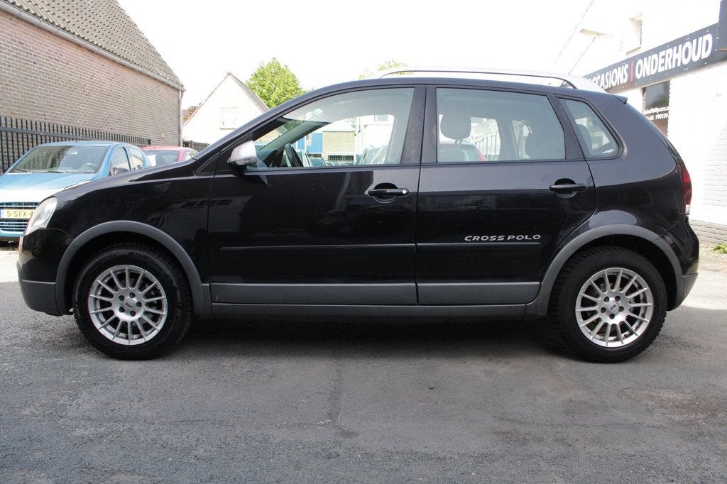 Volkswagen Polo 1.4-16V Comfortline Cross | Airco | Elec ram, Voorwielaandrijving, Gebruikt, Zwart, Stoelverwarming