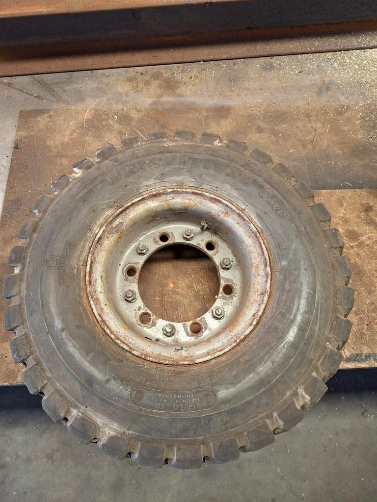 Bridgestone Heftruck/Kooiaap Band met Deelbare Velg 6.50-10, Ophalen of Verzenden