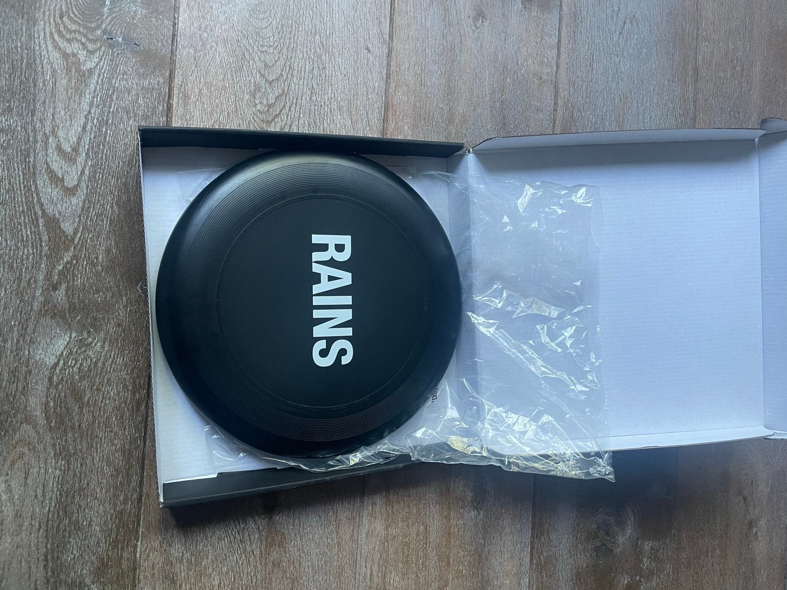Nieuwe Rains Frisbee Zwart - Perfect voor Park & Strand, Ophalen, Nieuw
