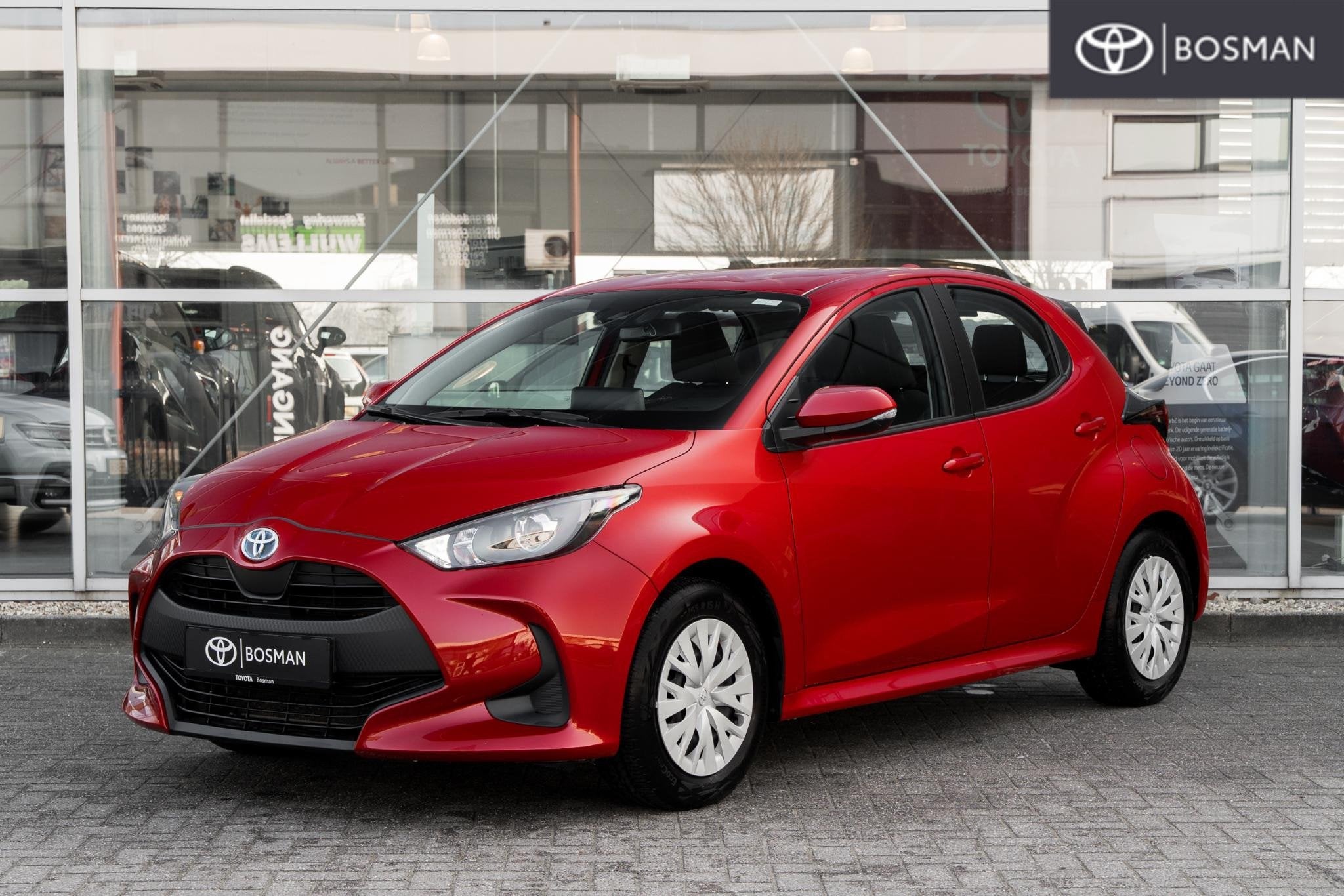 Toyota Yaris 1.5 Hybrid Active Navi, Auto's, Stof, Gebruikt, Euro 6, Automatische klimaatregeling