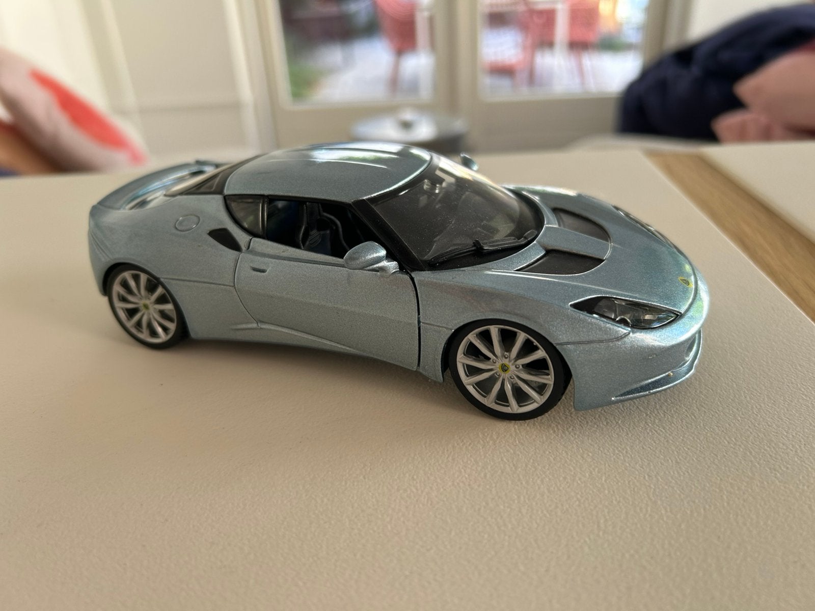 Lotus Evora 1:24 in ice blue, Ophalen of Verzenden, Zo goed als nieuw