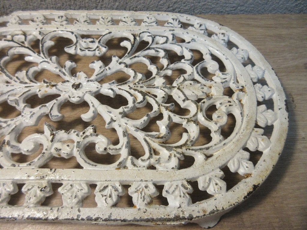 Brocante ovale gietijzeren onderzetter, Ophalen of Verzenden, Gebruikt