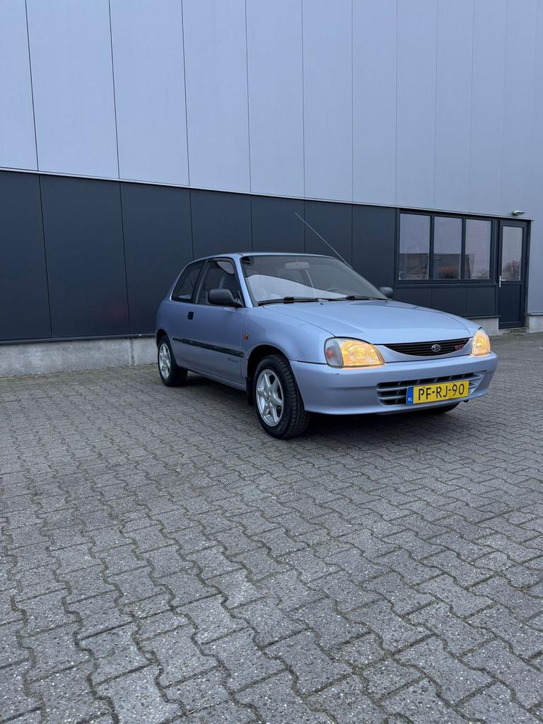 Daihatsu Charade 1.3 I 16V AUT 1996 Grijs, Auto's, Daihatsu, 4 cilinders, 400 kg, Origineel Nederlands, Radio