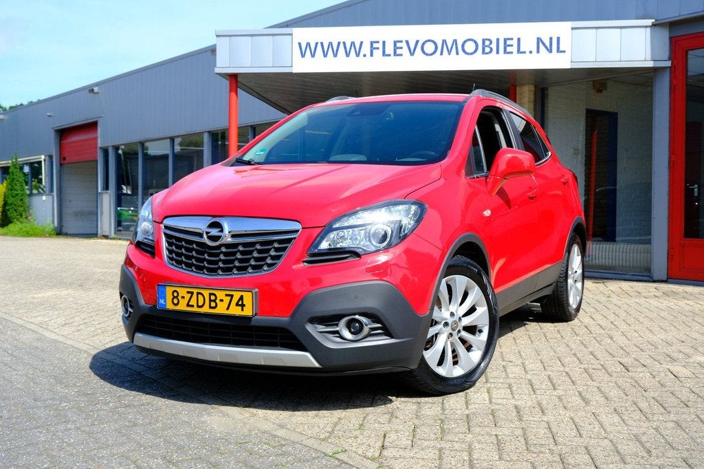 Opel Mokka 1.4 T 140pk Cosmo Xenon|Leder|Navi|Cam|Clima|LMV, Auto's, Voorwielaandrijving, Euro 5, Gebruikt, 4 cilinders