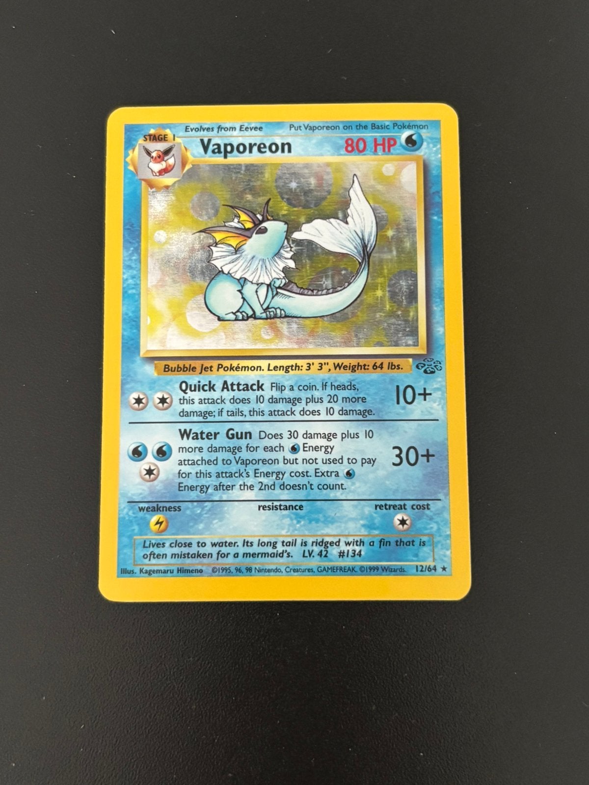 Vaporeon 12/64 jungle holo, Ophalen of Verzenden, Zo goed als nieuw