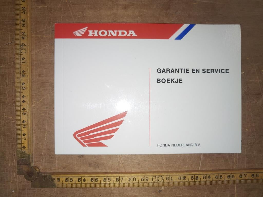 Honda Garantie- en serviceboekje1999, Ophalen of Verzenden, Zo goed als nieuw