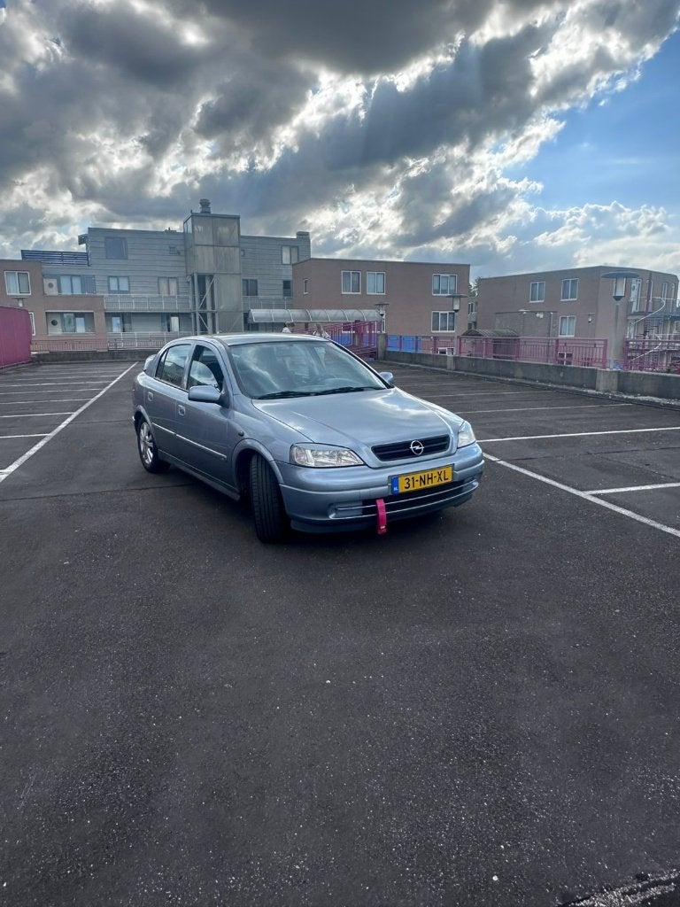 Opel Astra 1.6 goed onderhouden, Auto's, Opel, Voorwielaandrijving, Stof, Zwart, 4 cilinders