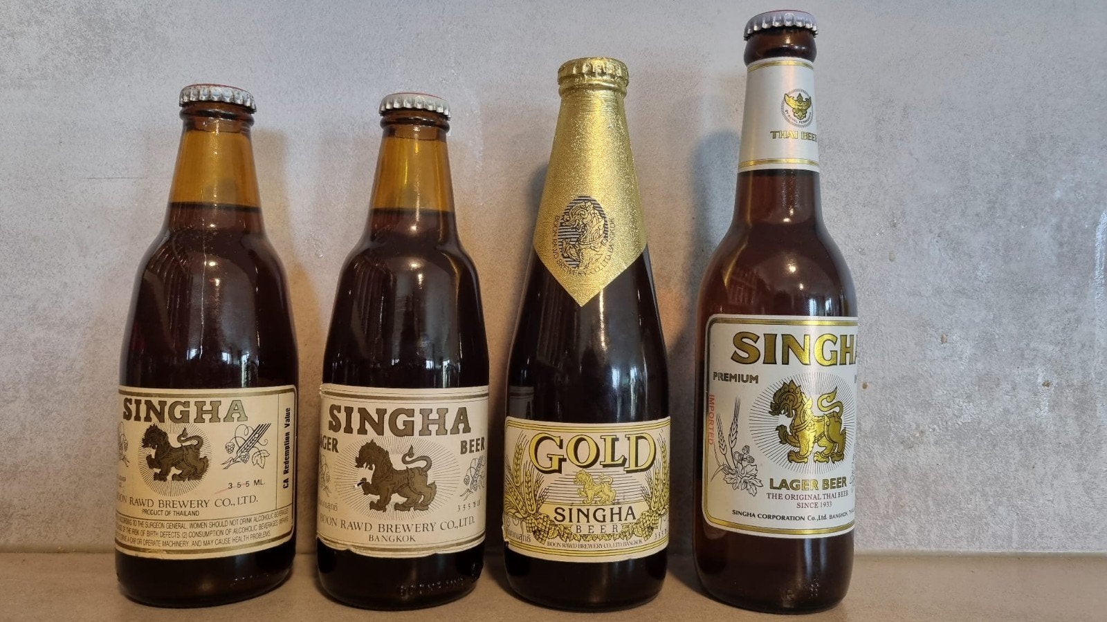 Singha: 3x '86: Lager, Gold & Export U.S.A. + '09 Swiss imp, Ophalen of Verzenden, Zo goed als nieuw, Flesje(s), Overige merken