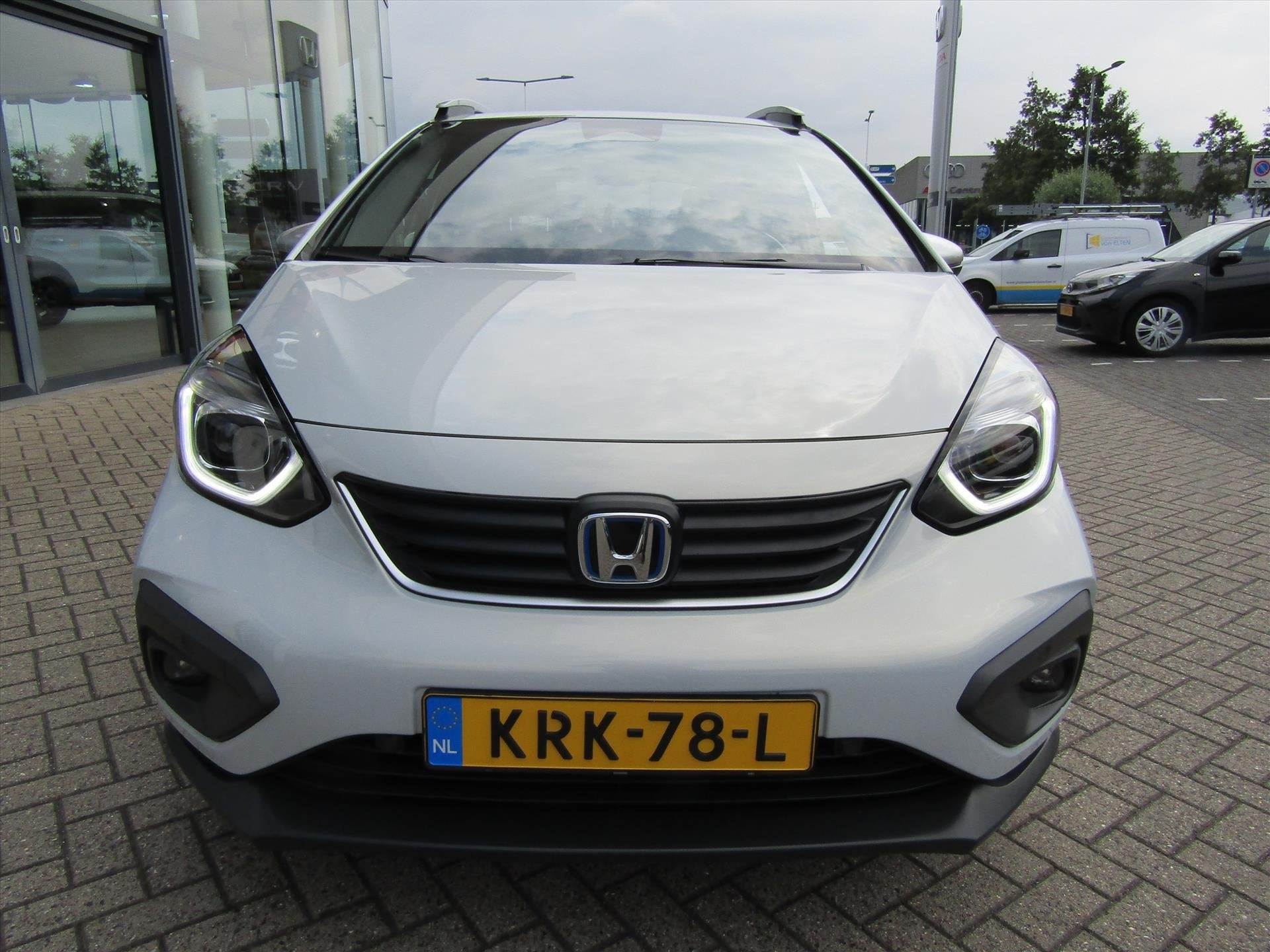 Honda Jazz 1.5 i-MMD 109pk Hybrid CVT Crosstar, Auto's, Stof, 4 cilinders, Wit, 98 pk
