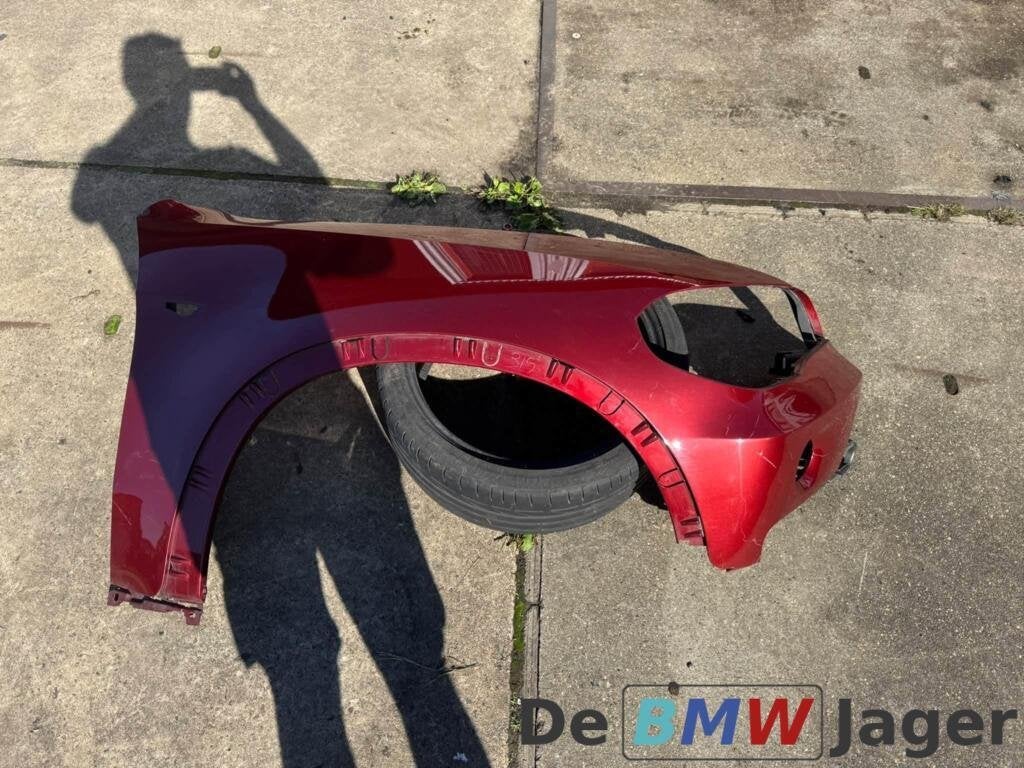 rechter spatbord vermilion rot A82 BMW X5 E70 51127157980, Gebruikt, Ophalen of Verzenden, BMW
