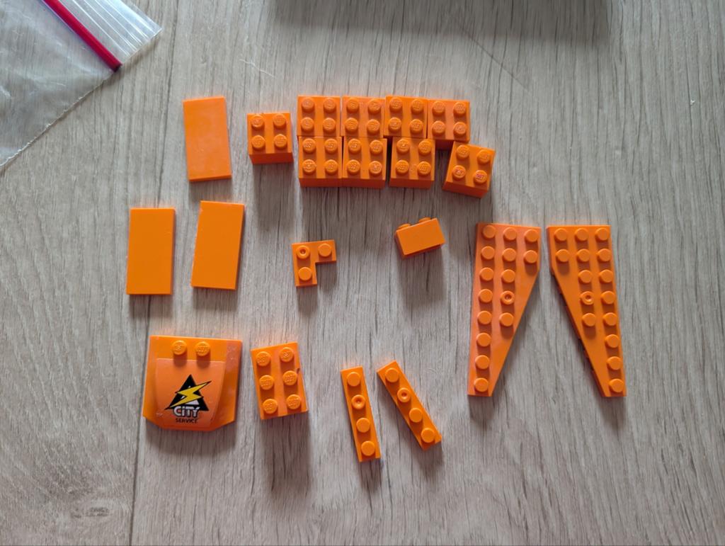 verzameling van oranje LEGO-stenen, Ophalen