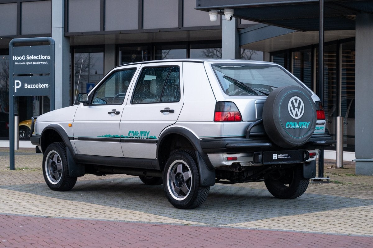 Volkswagen Golf 1.8 Country Syncro (bj 1992), Auto's, Oldtimers, Stof, Zwart, Volkswagen, Bedrijf