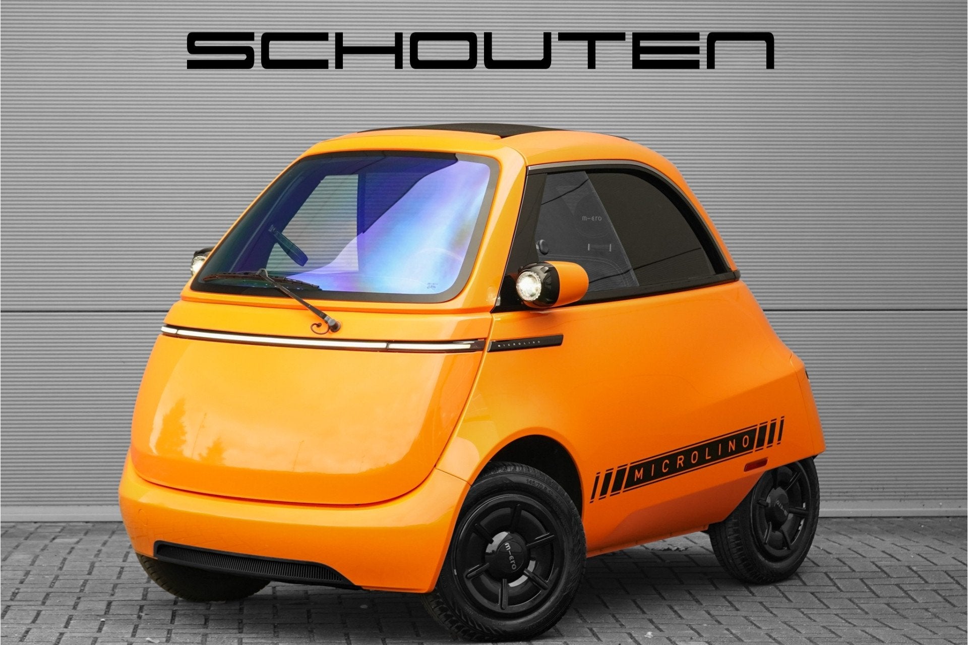 MICRO Microlino Dolce 15 kWh Schuifdak 230KM Actieradius Mic, Auto's, 12 maanden, Achterwielaandrijving, Gebruikt, Zwart