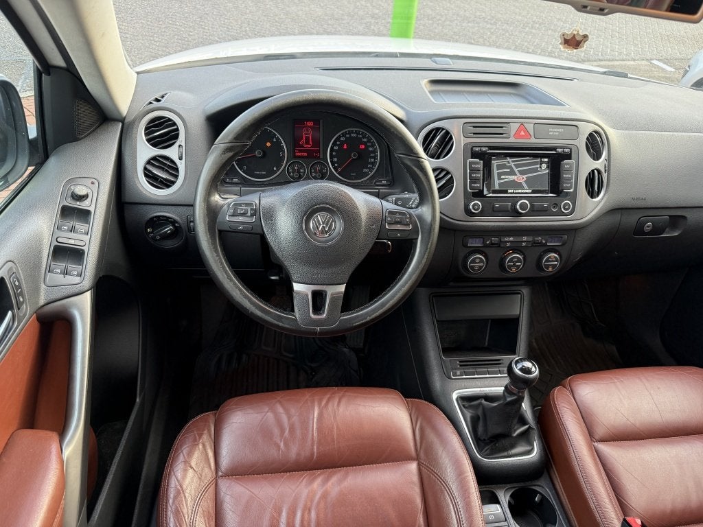 Volkswagen Tiguan 1.4 TSI Sport&Style 4Motion | trekhaak |, 13 km/l, Gebruikt, 4 cilinders, Wit
