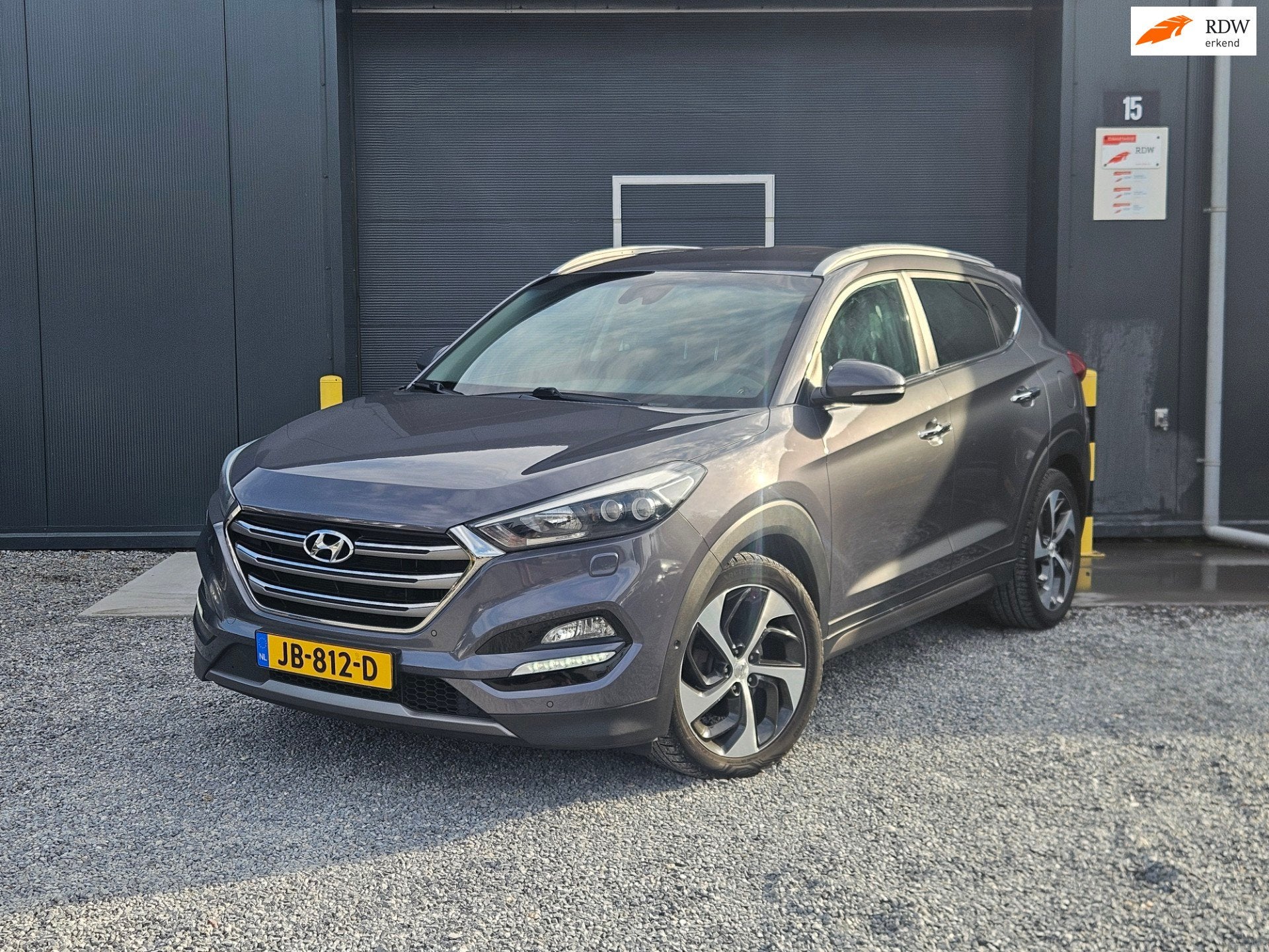 Hyundai Tucson 1.6 T-GDi Premium 4WD Vol optie LEER, Auto's, Gebruikt, 4 cilinders, Leder, Bedrijf