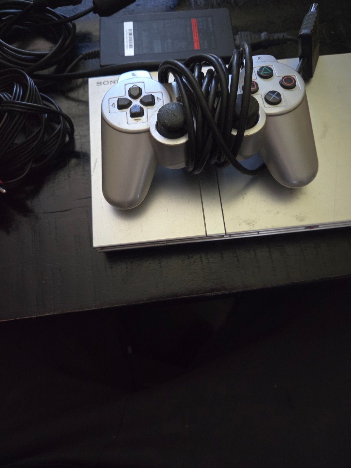 ps2 zilver slim met 1 controller ., Spelcomputers en Games, Ophalen, Gebruikt, Zilver, Met 1 controller