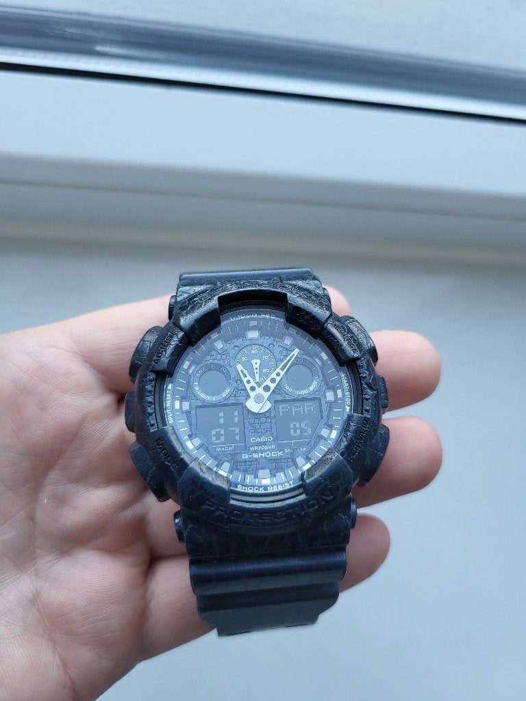 Casio G-Shock GA-100CG-2A - Krasvrij / Band defect, Sieraden, Tassen en Uiterlijk, Horloges | Heren, Ophalen, Casio, Kunststof