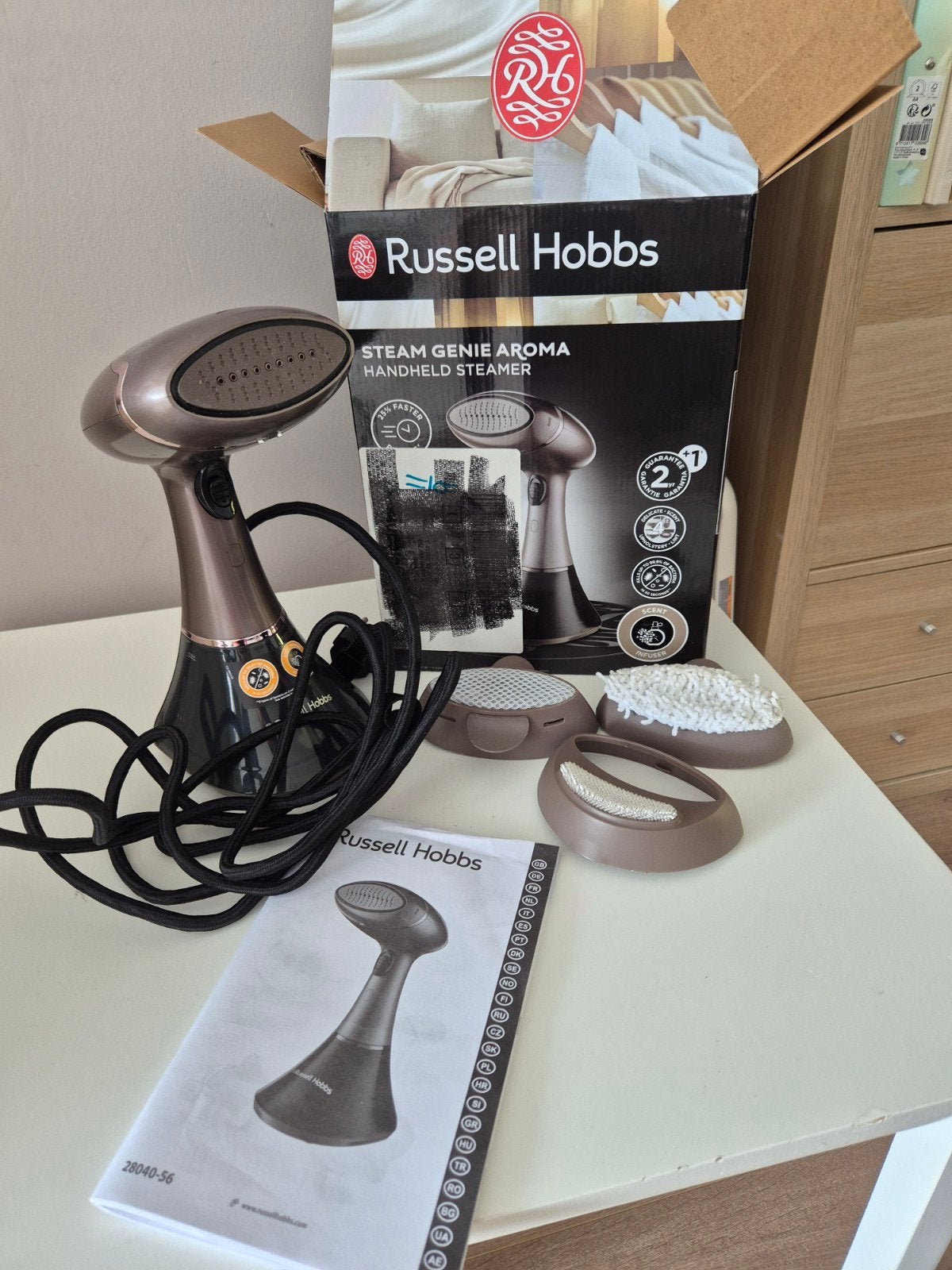 Russel hobbs kleding stomer, Ophalen