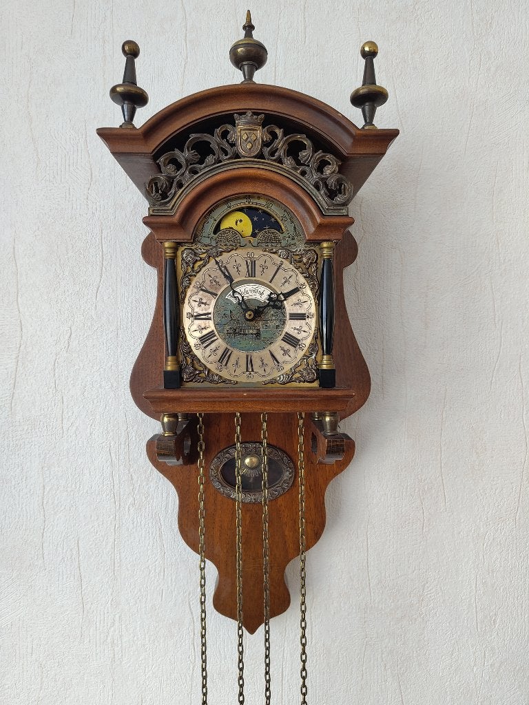 Warnink Sallander wandklok met maanschijf, Ophalen