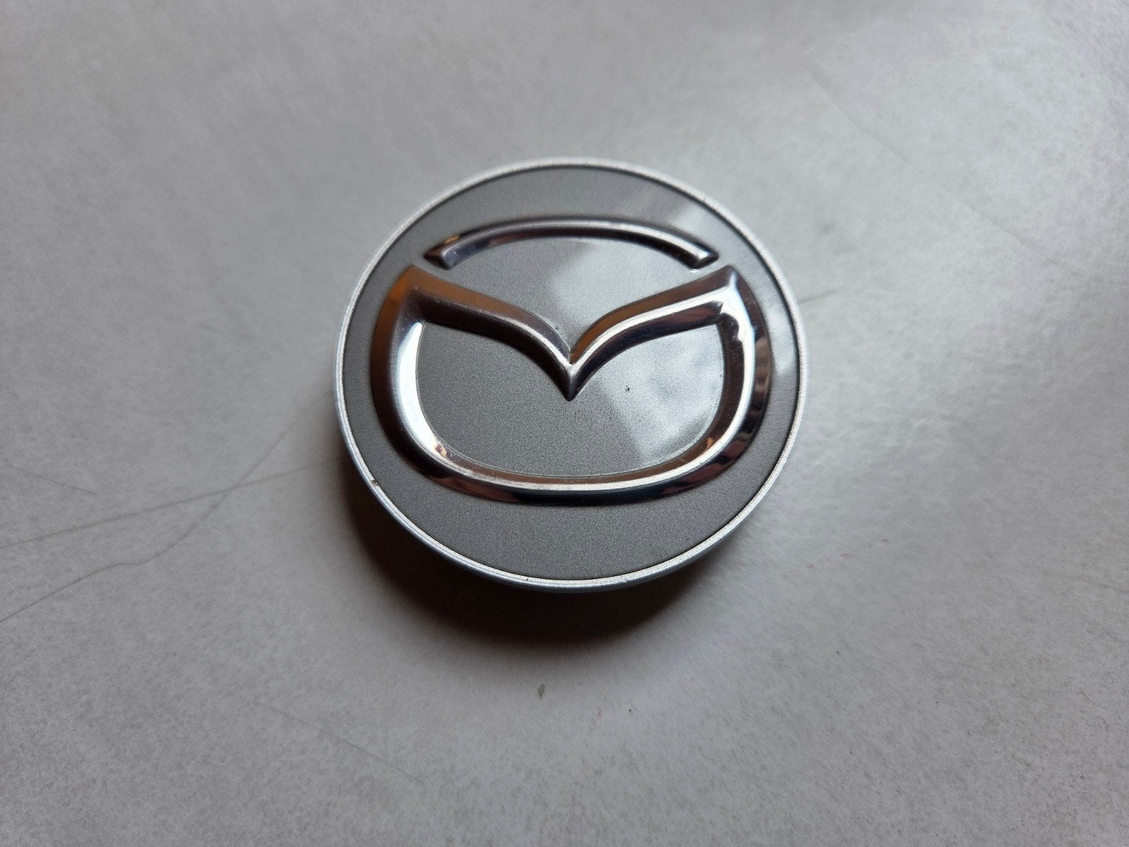 Mazda naafdop, Ophalen of Verzenden, Zo goed als nieuw