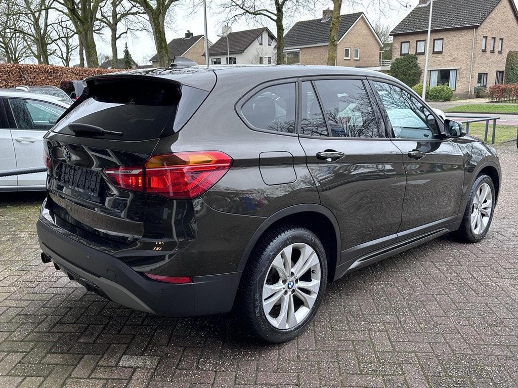 BMW X1 sDrive18i Sport Line Navi, Leer, Climat, Pdc, LM.., Auto's, BMW, 136 pk, Gebruikt, Bruin, Leder