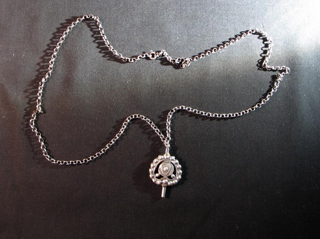 Horlogesleutel antiek zilver jasseronketting (achtjes). 2005, Antiek en Kunst, Ophalen of Verzenden, Zilver
