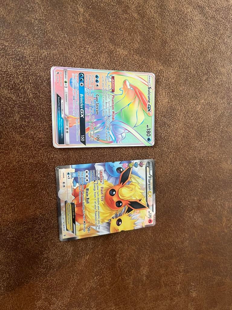 Pokémon kaarten (Suicune GX & Flareon EX) met lichte schade, Hobby en Vrije tijd, Verzamelkaartspellen | Pokémon, Gebruikt, Meerdere kaarten