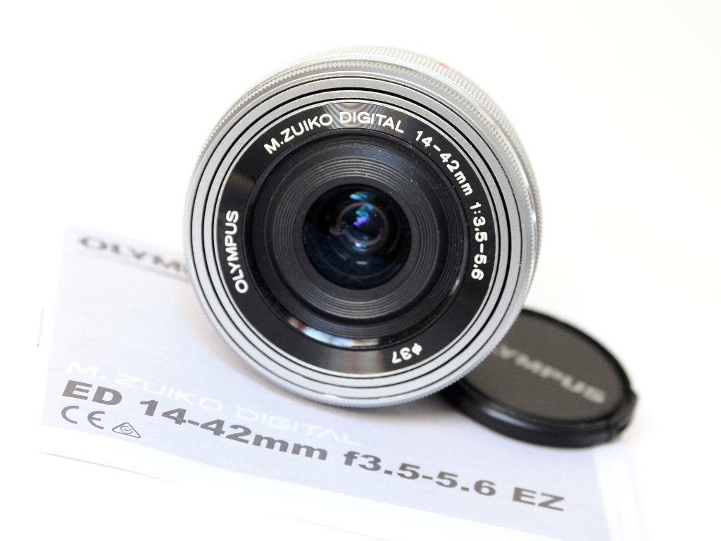 Olympus M.Zuikol 14-42mm F/3.5-5.6 Pancake EZ, nieuwstaat, Audio, Tv en Foto, Fotografie | Lenzen en Objectieven, Handmatige focus