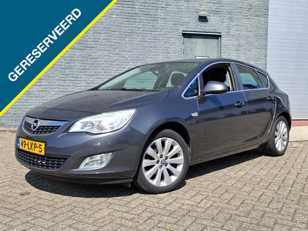 Opel Astra 1.4 Cosmo 5Drs Ecc/Cruise/Nw APK ✅ (bj 2010), Euro 5, 101 pk, Gebruikt, 4 cilinders