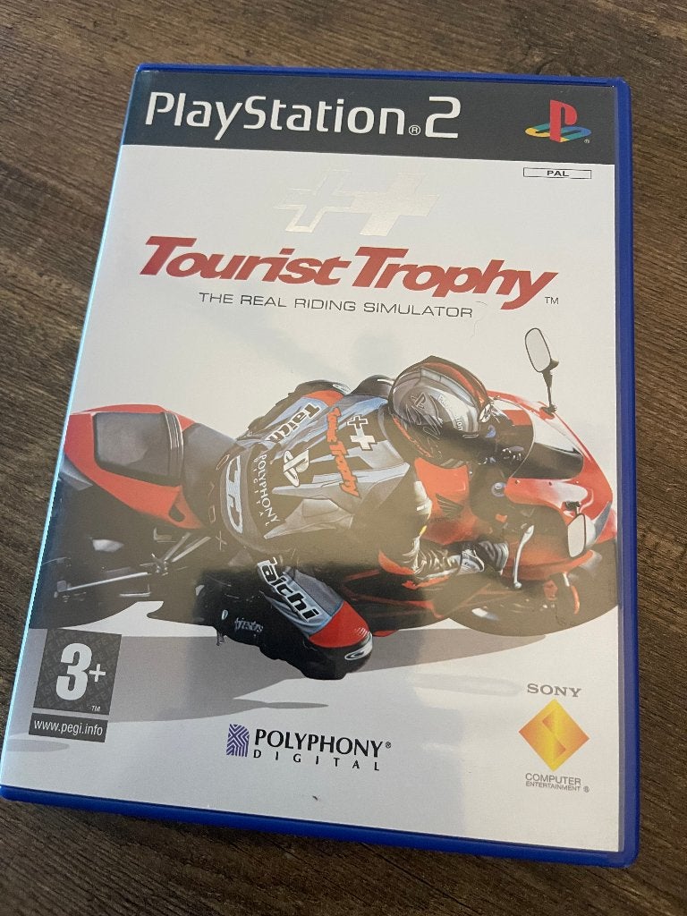 Tourist Trophy TT - PS 2 + boekje / makers van Gran Tourismo, Gebruikt, 1 speler, Racen en Vliegen, Eén computer