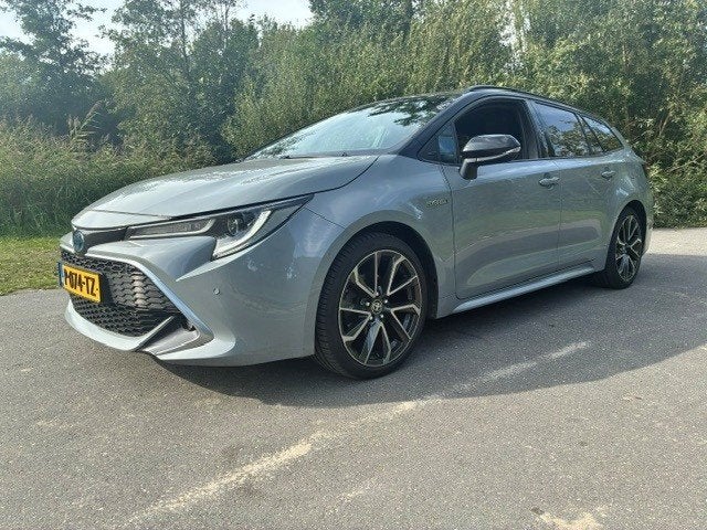 Toyota Corolla Touring Sports 1.8 Hybrid Executive, Auto's, Automaat, Gebruikt, 4 cilinders, Stationwagon