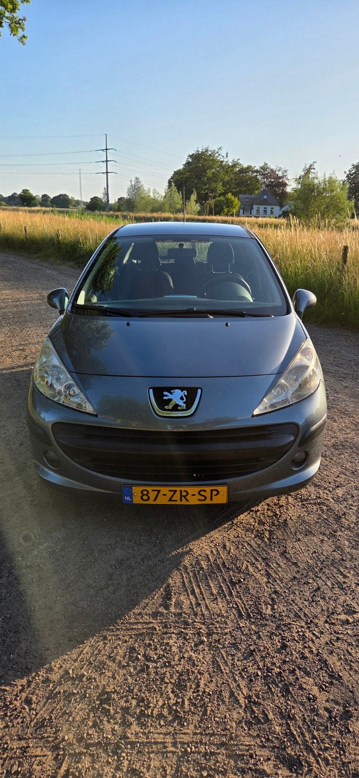 Peugeot 207 1.4 VTi Cool 'n Blue | 5-Deurs | Airco | Cruise, Auto's, Voorwielaandrijving, Metallic lak, Stof, Zwart