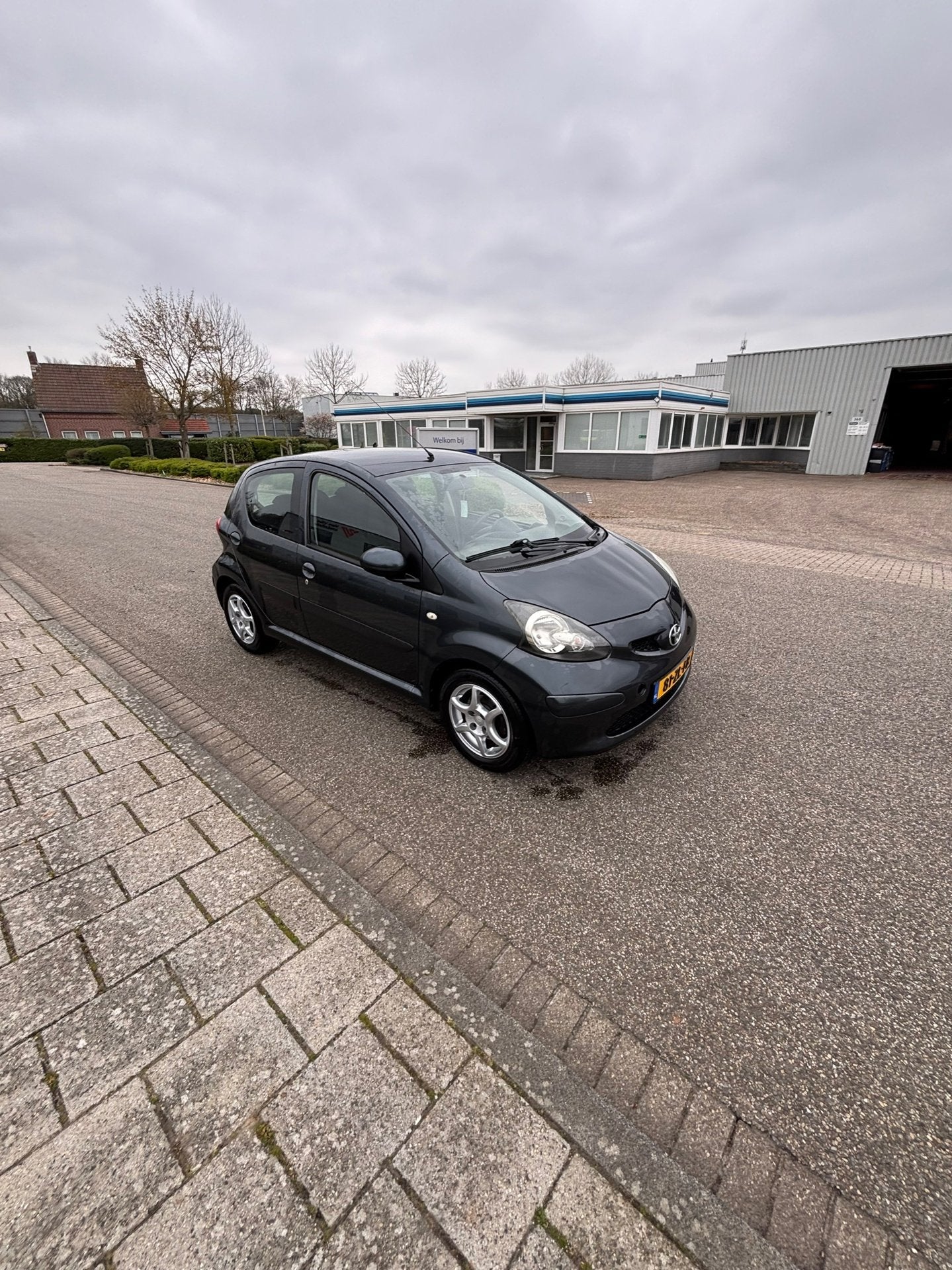 Toyota Aygo 1.0-12V + 5-deurs AIRCO 116633KM NAP, Auto's, Toyota, Voorwielaandrijving, Stof, Gebruikt, Zwart