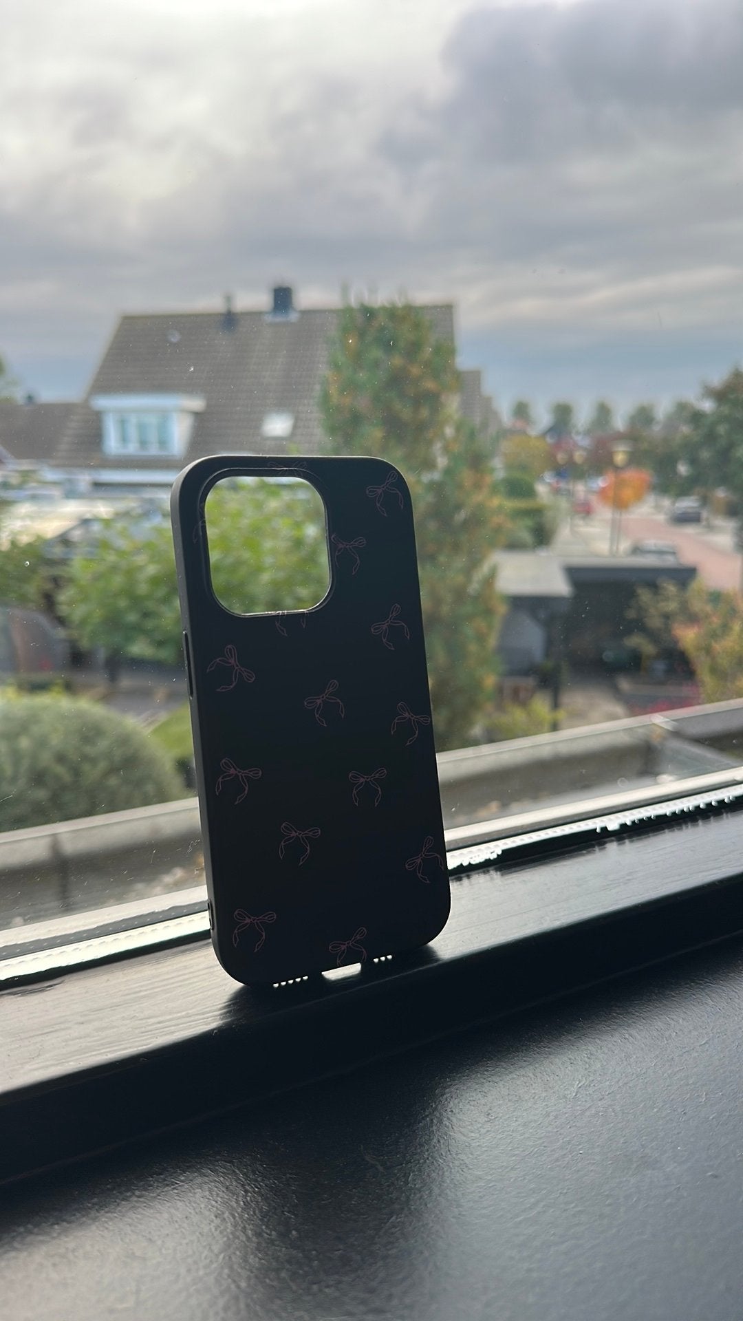 iPhone 14 Pro hoesje zwart met roze strikjes, Zwart, Nieuw, Ophalen of Verzenden, 128 GB