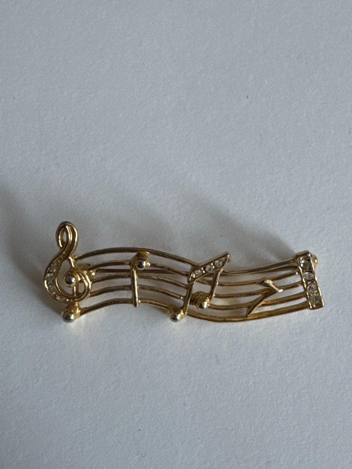 Muzieknoot broche met strass, Overige materialen, 4 tot 7 cm, Gebruikt, Ophalen of Verzenden