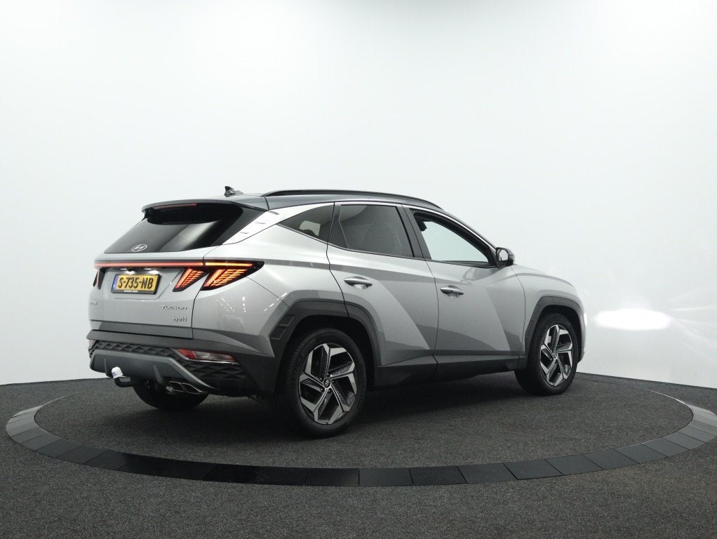 Hyundai Tucson 1.6 T-GDI HEV Premium | Leder | Navigatie | S, Auto's, Hyundai, 12 maanden, Gebruikt, 4 cilinders, 1650 kg
