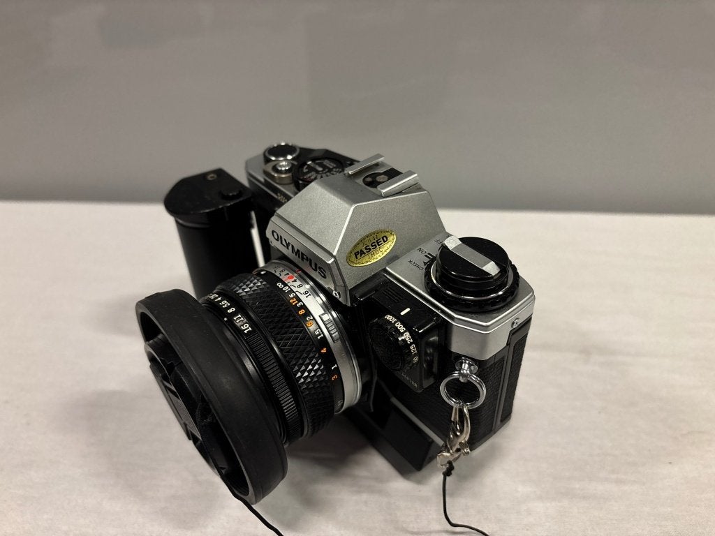 Olympus OM10 spiegelreflex met winder, Panagor tele en doos, Gebruikt, Niet bekend (tweedehands product), Spiegelreflex, Olympus