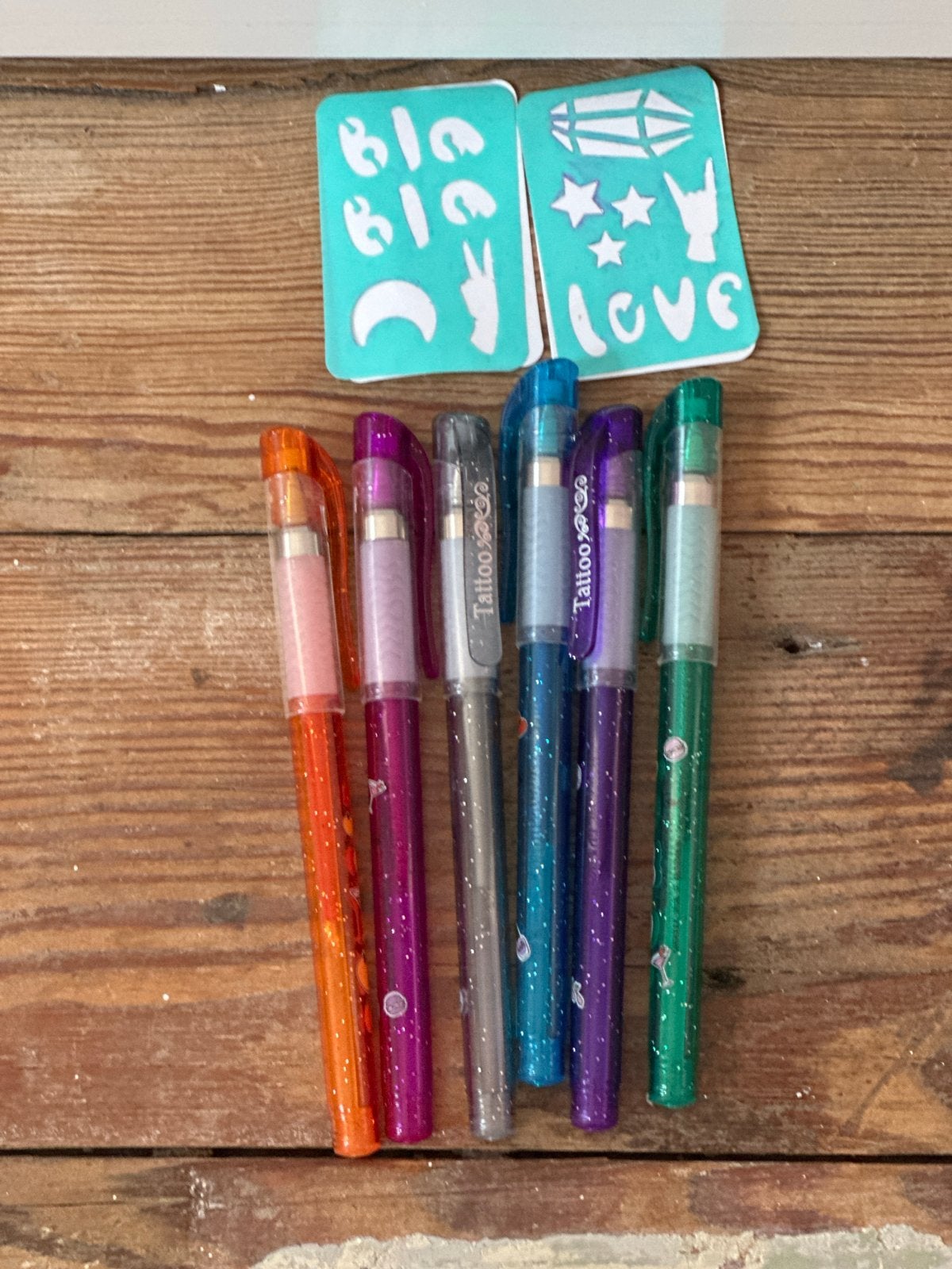 Tattoo Glitter Pennen Set met Stencils, Ophalen of Verzenden, Gebruikt, Potlood of Stift