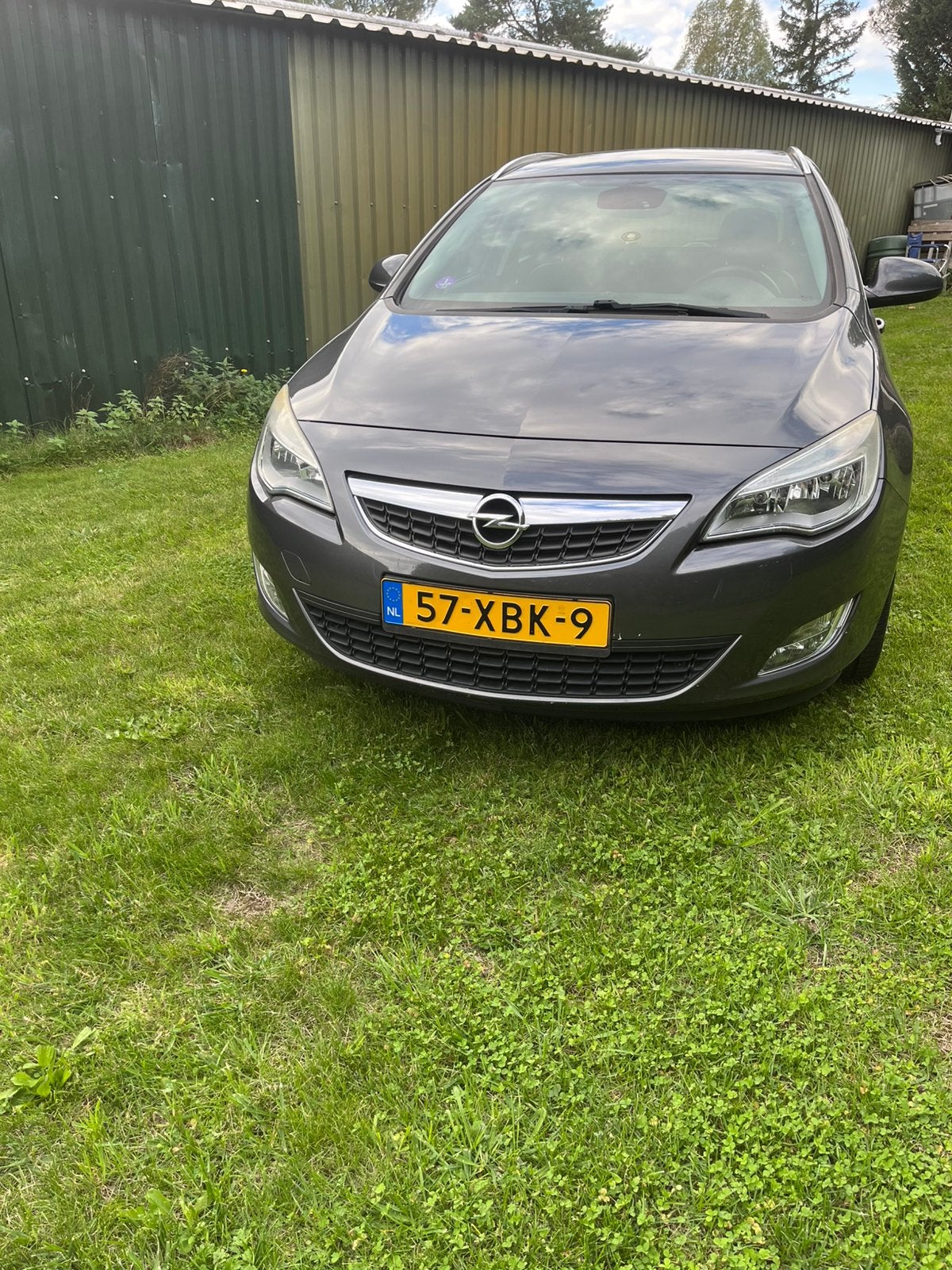 Opel Astra 1.4 Turbo 103KW Sports Tourer 2012 Grijs, Auto's, Voorwielaandrijving, 4 cilinders, Leder en Stof, Multifunctioneel stuurwiel