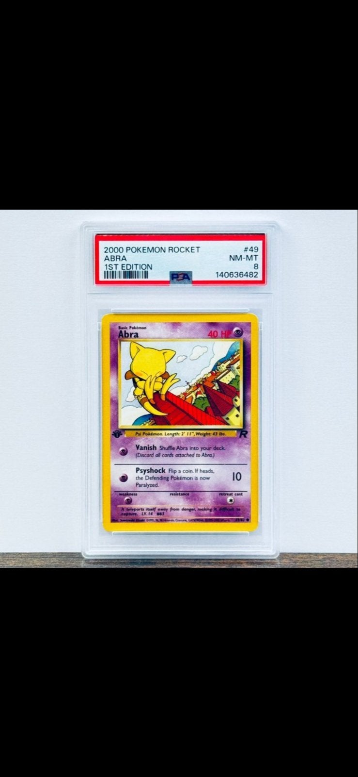 2000 Pokemon Rocket Abra 1st Edition PSA 8, Verzenden, Zo goed als nieuw, Losse kaart