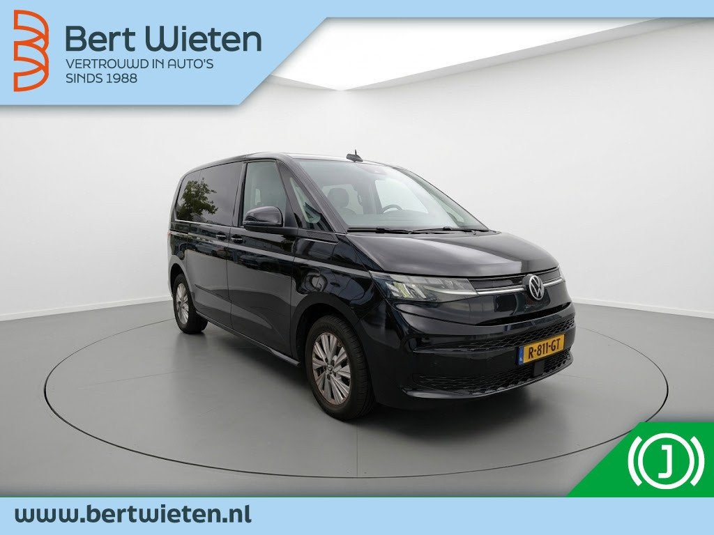 Volkswagen Multivan 1.4 eHyb. L1H1 Life | Geen import | 7 Pe, Auto's, Automaat, Dealer onderhouden, Stof, Gebruikt