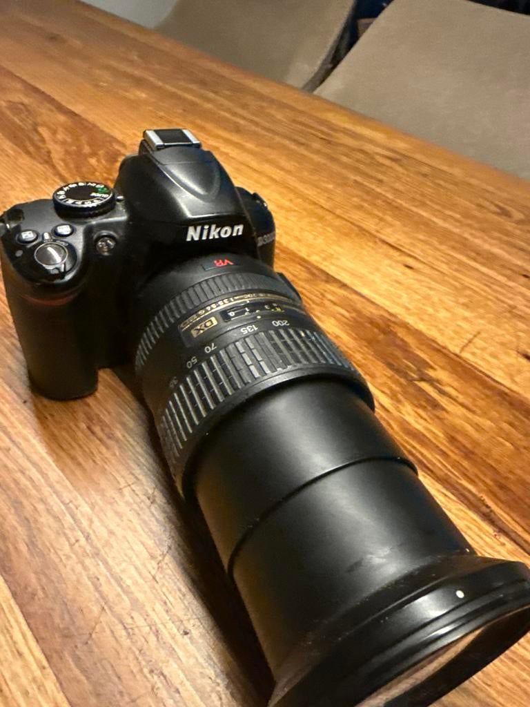 Nikon D3000 Spiegelreflexcamera met 18-200mm lens, Gebruikt, Spiegelreflex, Ophalen of Verzenden, Nikon
