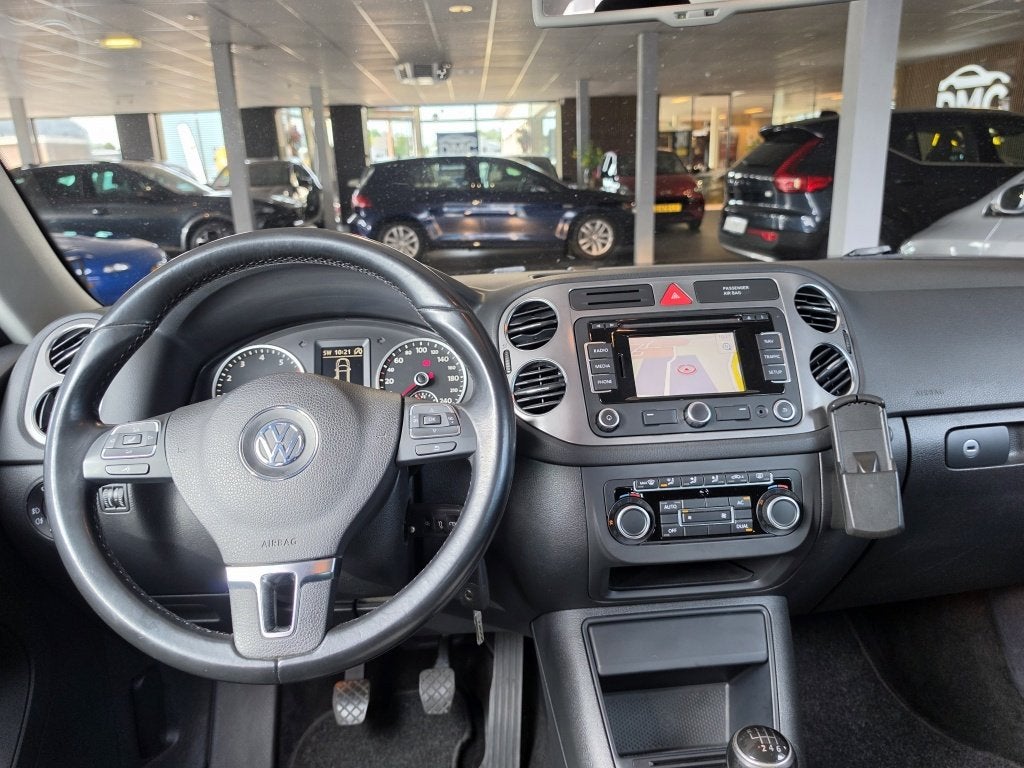 Volkswagen Tiguan 1.4 TSI Sport & Style | Park Assist | airc, Auto's, Keurmerk '100% Onderhouden', 4 cilinders, Zwart, Origineel Nederlands