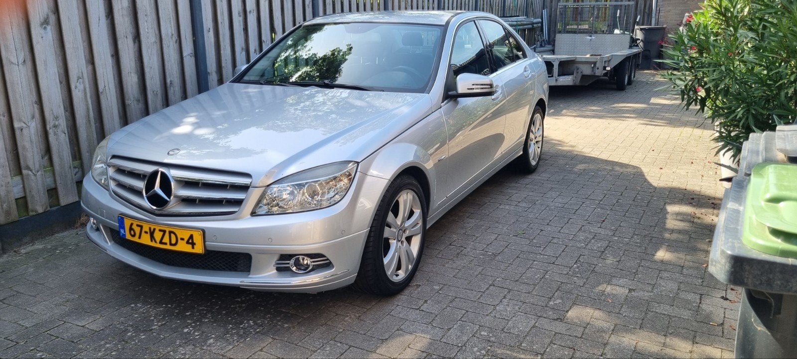 Mercedes-Benz C-Klasse 1.8 C180 CGI Sedan AUT 2010 Grijs, Auto's, Mercedes-Benz, Automaat, 745 kg, Achterwielaandrijving, 1800 kg