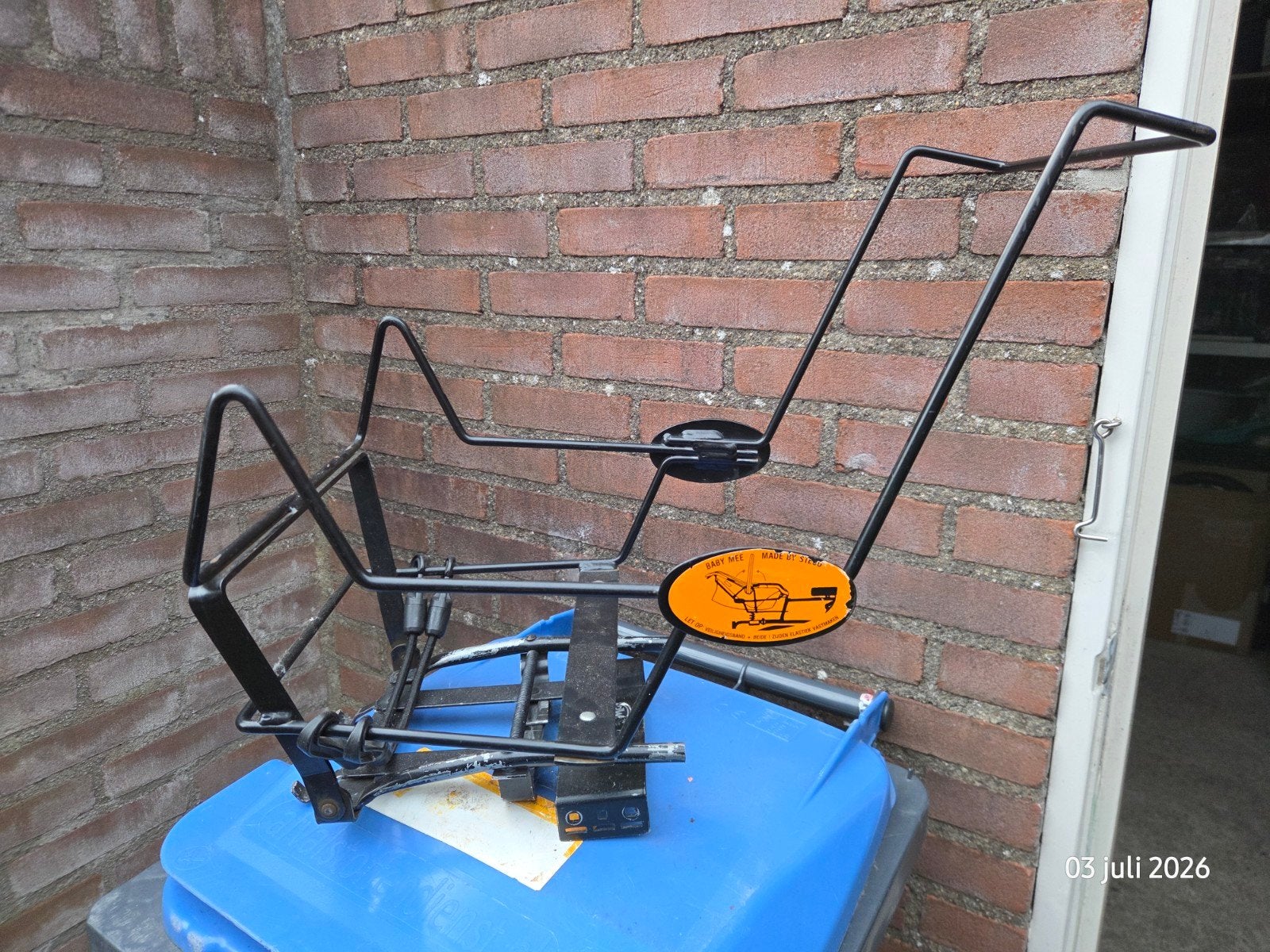 Baby Mee fietsstoeltje (maxi cosi), Ophalen