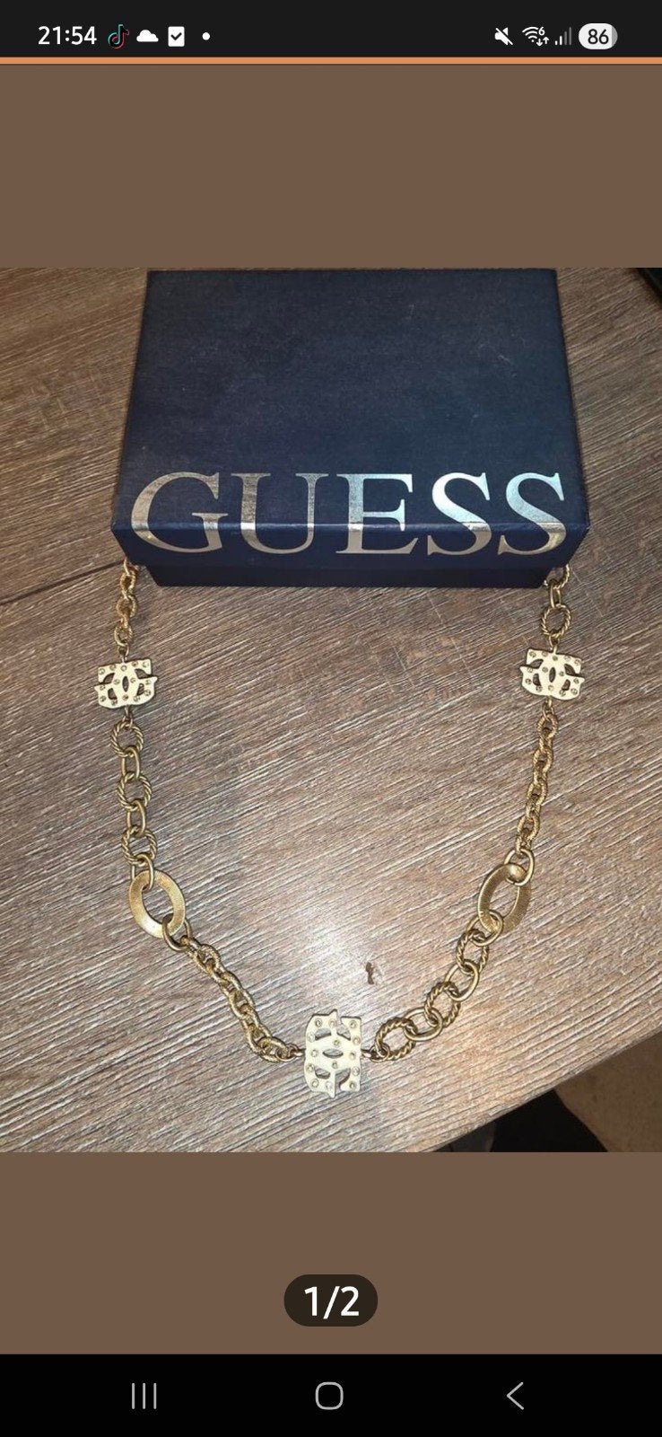 Guess Gouden Ketting met Logo Hangers, Gebruikt, Ophalen of Verzenden, Goud, Overige materialen