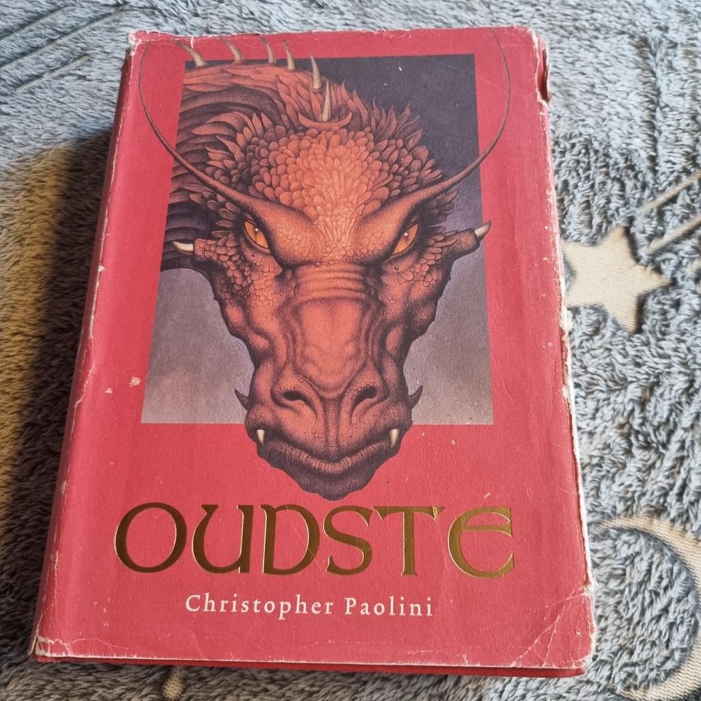 Oudste - Christopher Paolini, Boeken, Fantasy, Gelezen, Ophalen of Verzenden