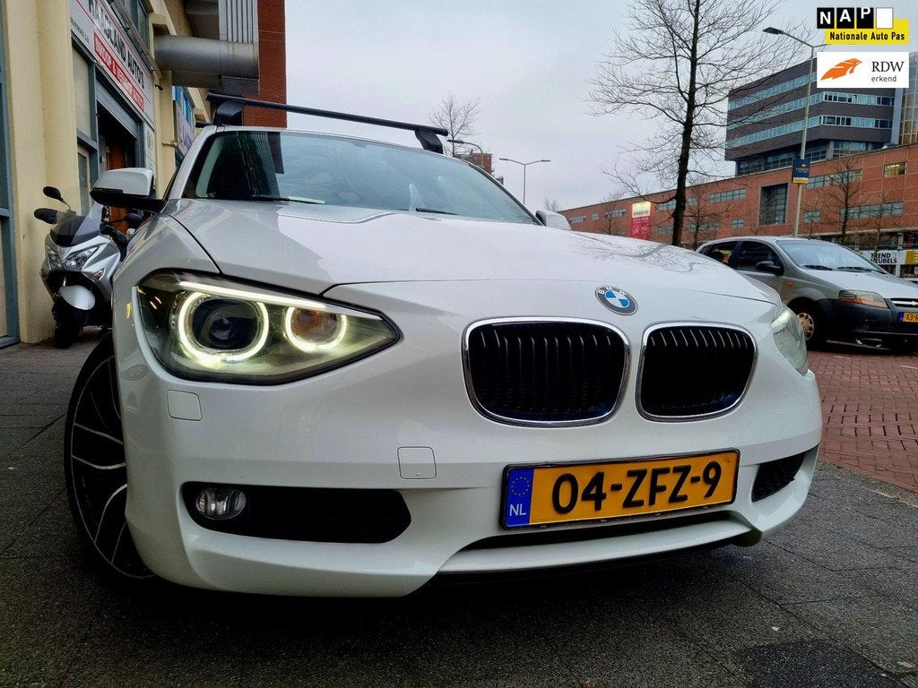 BMW 1-serie 114i Business+ Navi Airco ElecRam xenon, Auto's, BMW, Bedrijf, Te koop, 1-Serie, ABS, Airbags, Airconditioning, Automatische klimaatregeling
